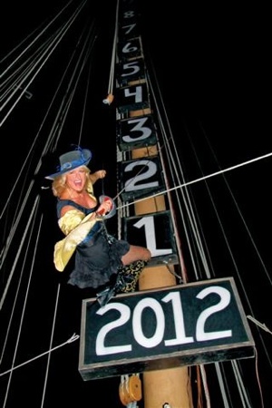 Image 2 - Evalena Worthington practices her descent from a tall ship's mast at the Schooner Wharf Bar, in advance of this year's celebration. 